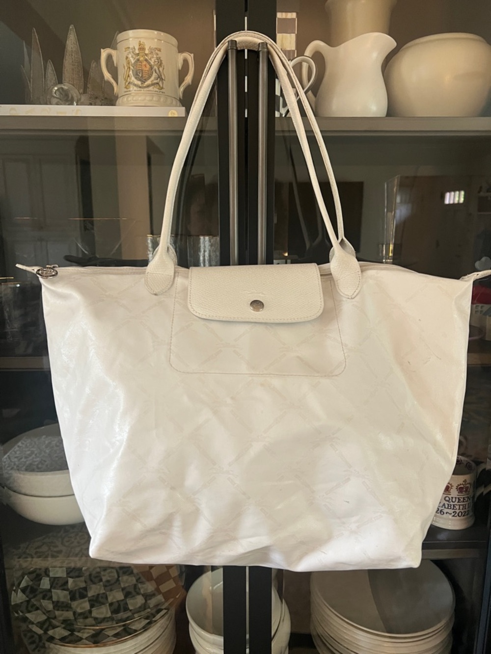LongChamp travel tote with limited edition pattern.